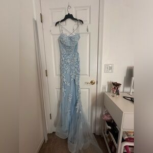 Light blue floral prom dress. Criss cross back. Size 2